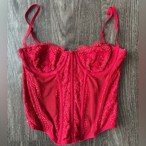Urban Outfitters Corset in red. Size M